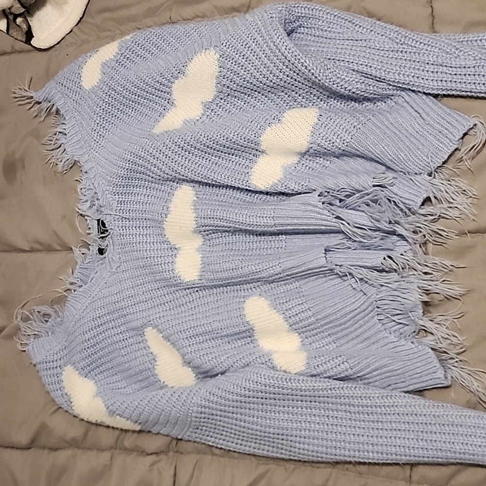 Cute sweater with clouds